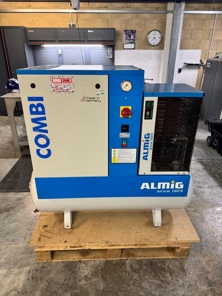 Almig Combi compressor on a wooden pallet in an industrial setting