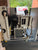 Mechanical equipment with visible branding in the background