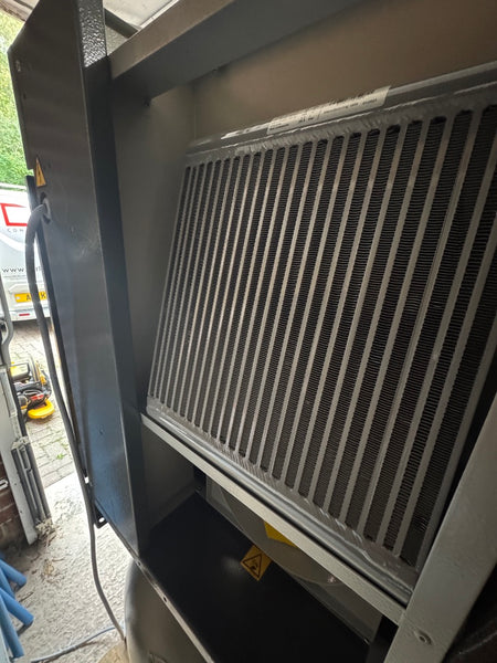 Large industrial air filter or cooling unit with a grid design.