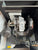 Close-up of mechanical components inside a machine or vehicle.