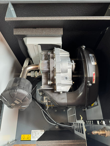 Close-up of mechanical components inside a machine or vehicle.