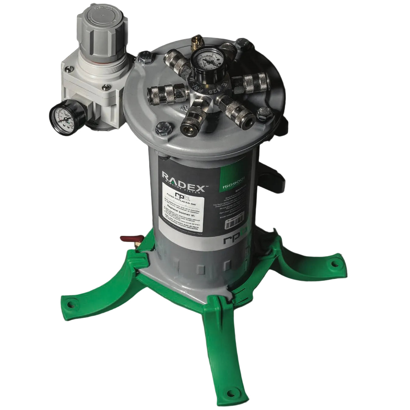 Mechanical device with green stand on a dark concrete floor