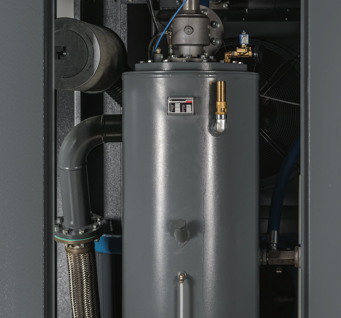 Gray water heater with pipes and components in a mechanical room