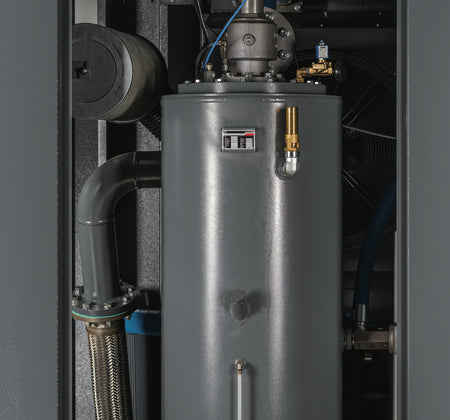 Gray water heater with pipes and components in a mechanical room