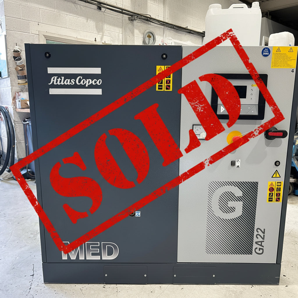 Atlas Copco industrial compressor in a workshop setting