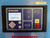 A BOGE industrial control panel with a dark frame, featuring a blue and purple faceplate, a small digital display screen, and multiple physical buttons including yellow and red buttons on a blue painted metal surface.