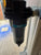 Atlas Copco air compressor filter with 'DDp7+' marking on a textured surface.